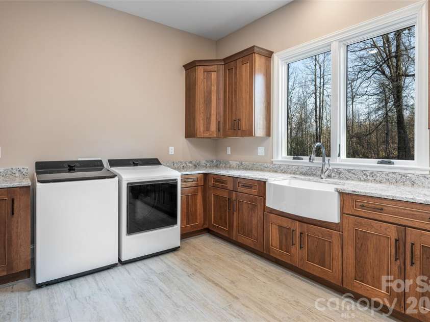527 Falkirk Way, Zirconia, NC 28790.  MLS# CAR4364609, YatesRealty ID 8977. Laundry Room