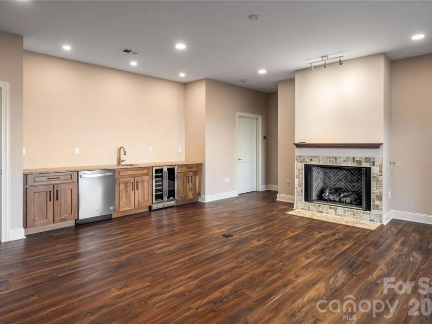 527 Falkirk Way, Zirconia, NC 28790.  MLS# CAR4364609, YatesRealty ID 8977. Lower Level Family Room