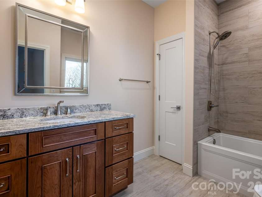 527 Falkirk Way, Zirconia, NC 28790.  MLS# CAR4364609, YatesRealty ID 8977. Lower Level Guest Suite