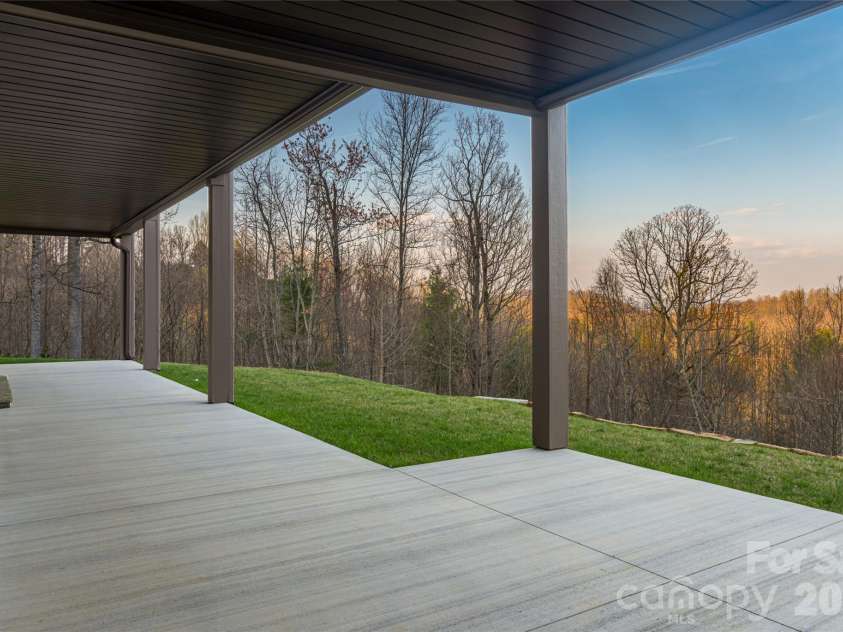 527 Falkirk Way, Zirconia, NC 28790.  MLS# CAR4364609, YatesRealty ID 8977. Lower Level Patio