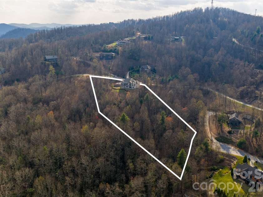 527 Falkirk Way, Zirconia, NC 28790.  MLS# CAR4364609, YatesRealty ID 8977. Over 3 acres