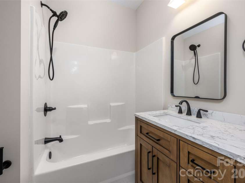 527 Falkirk Way, Zirconia, NC 28790.  MLS# CAR4364609, YatesRealty ID 8977. Upper Level En-Suite Bedroom