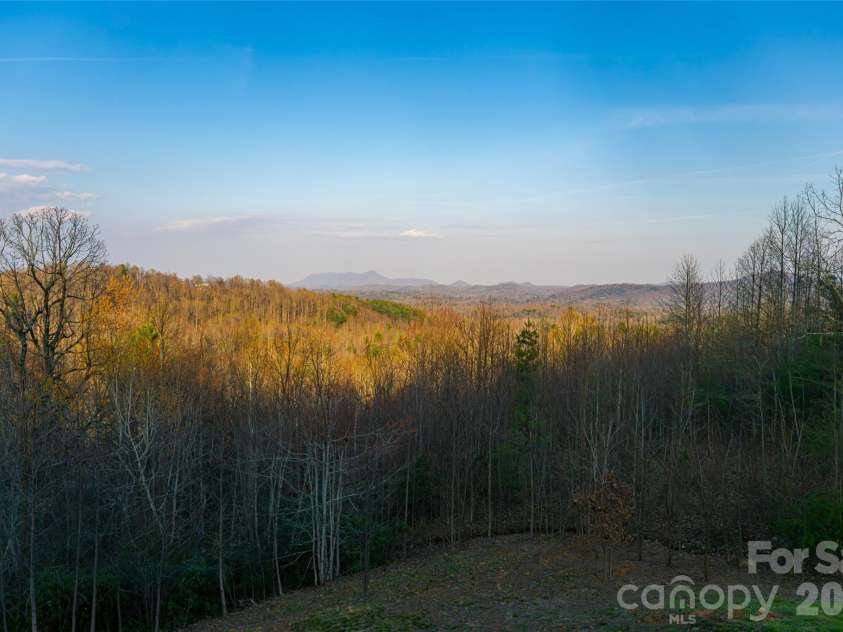 527 Falkirk Way, Zirconia, NC 28790.  MLS# CAR4364609, YatesRealty ID 8977. Year-round, panoramic mountain views