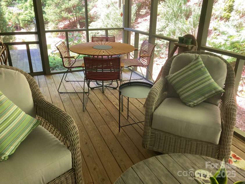 723 Merrills Cove Road, Asheville, NC 28803.  MLS# CAR4249299, YatesRealty ID 8978. Screened Porch
