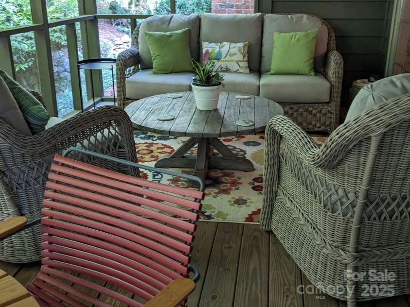 723 Merrills Cove Road, Asheville, NC 28803.  MLS# CAR4249299, YatesRealty ID 8978. Screened Porch