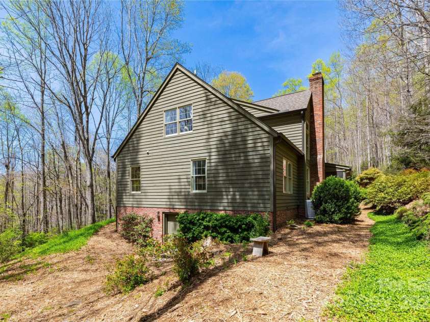 723 Merrills Cove Road, Asheville, NC 28803.  MLS# CAR4249299, YatesRealty ID 8978. Side of Home