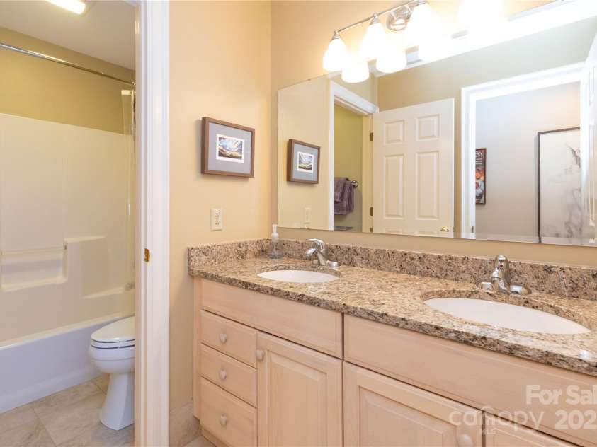 723 Merrills Cove Road, Asheville, NC 28803.  MLS# CAR4249299, YatesRealty ID 8978. Upstairs Bathroom