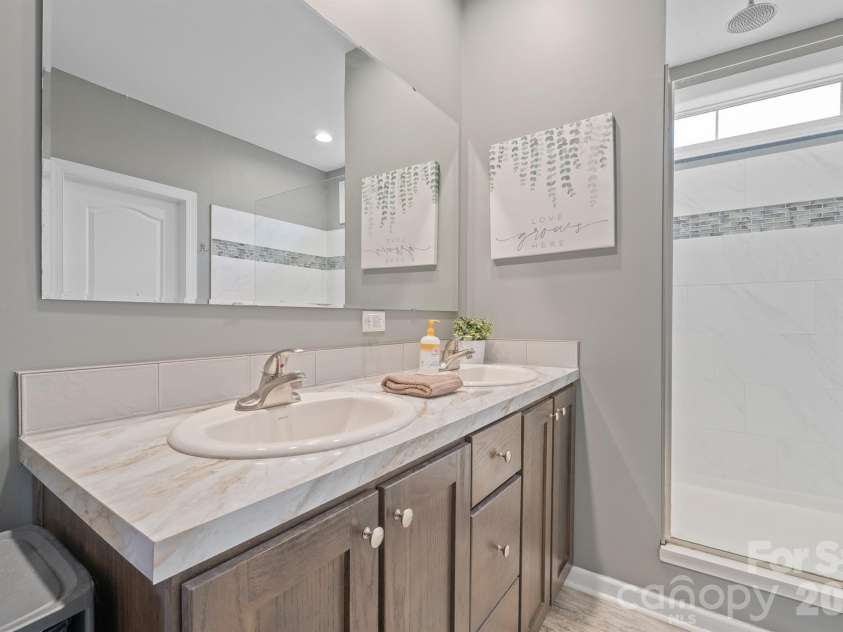 486 Stutts Road, Mooresville, NC 28117.  MLS# CAR4329027, YatesRealty ID 8982. Primary bath