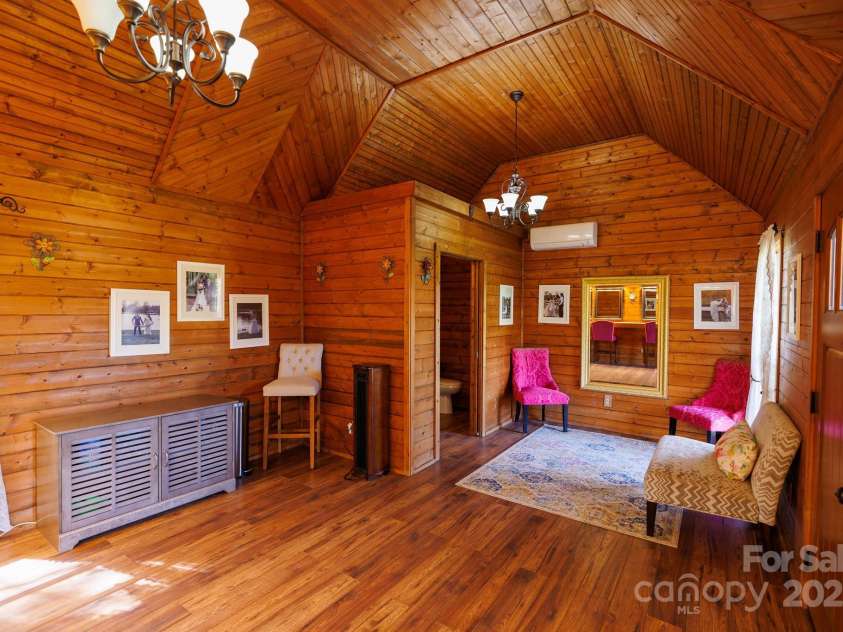 4229 Motocross Trail, Edgemoor, SC 29712.  MLS# CAR4238485, YatesRealty ID 8991. Cozy cabin-  perfect for staging your dream wedding venue moments.