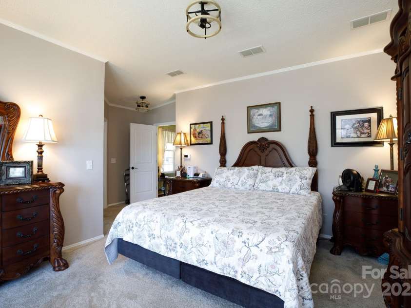 4229 Motocross Trail, Edgemoor, SC 29712.  MLS# CAR4238485, YatesRealty ID 8991. Primary bedroom with remodeled bath, walk in closet and craft room attached.