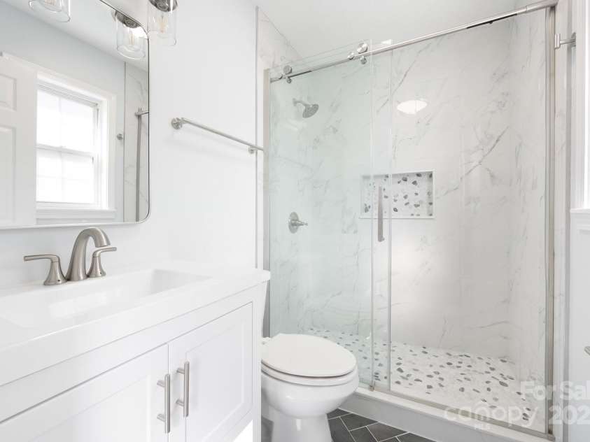 5 Rash Road, Asheville, NC 28806.  MLS# CAR4232362, YatesRealty ID 8992. Primary Bath Features Walk-In Shower