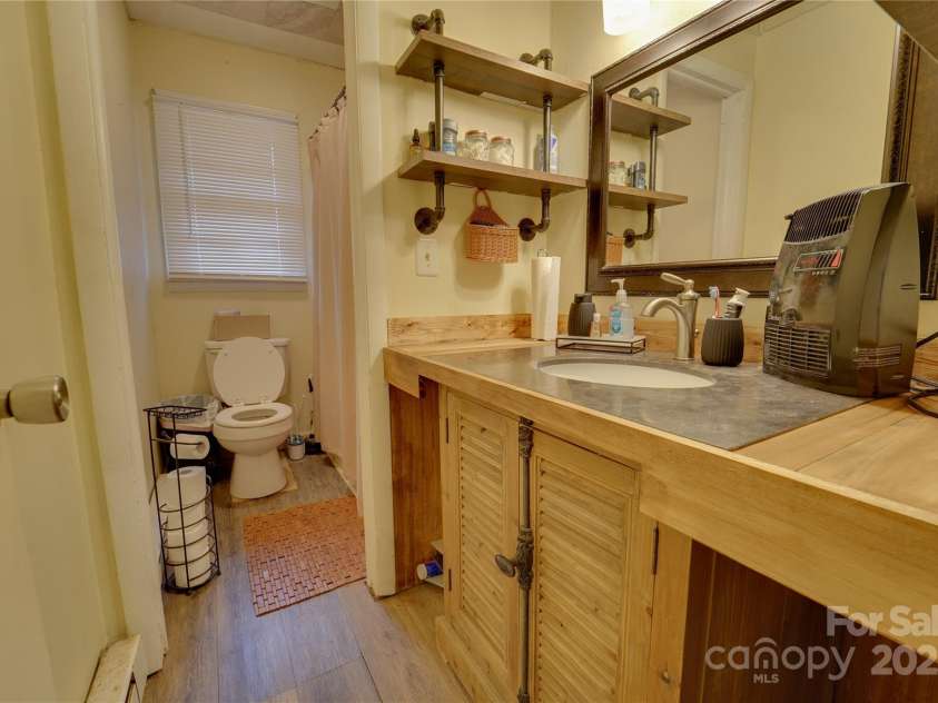 1 Virginia Lane, Cullowhee, NC 28723.  MLS# CAR4238066, YatesRealty ID 8994. Bathroom
