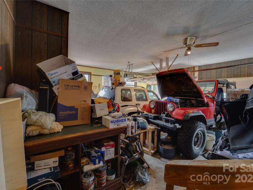 1 Virginia Lane, Cullowhee, NC 28723.  MLS# CAR4238066, YatesRealty ID 8994. Garage