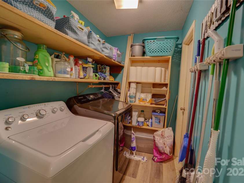 1 Virginia Lane, Cullowhee, NC 28723.  MLS# CAR4238066, YatesRealty ID 8994. Laundry