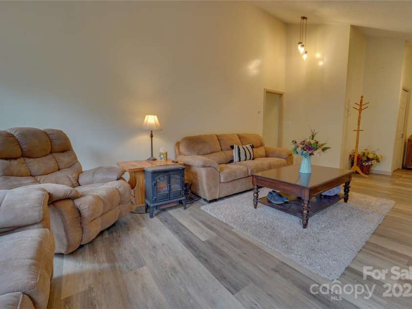 1 Virginia Lane, Cullowhee, NC 28723.  MLS# CAR4238066, YatesRealty ID 8994. Living Room