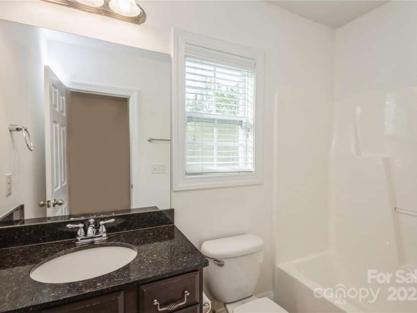 4015 Amber Leigh Way Drive, Charlotte, NC 28269.  MLS# CAR4251417, YatesRealty ID 8995. Guest Bathroom on Main