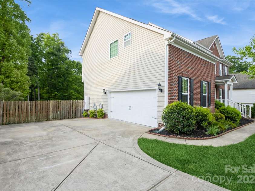 4015 Amber Leigh Way Drive, Charlotte, NC 28269.  MLS# CAR4251417, YatesRealty ID 8995. Side-entry 2-Car Garage
