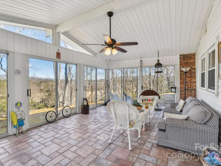 76 Royal Knoll Drive, Hendersonville, NC 28739.  MLS# CAR4223779, YatesRealty ID 8997. Sun Room off of dining area