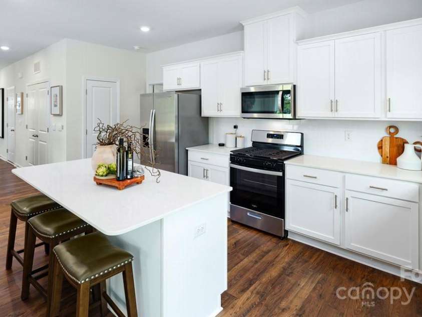 154 Shorthorn Road, Fletcher, NC 28732.  MLS# CAR4204391, YatesRealty ID 9. Photo is from a furnished model home of the same floorplan.