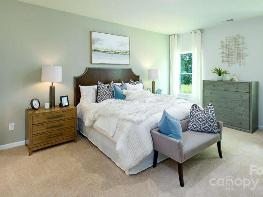 154 Shorthorn Road, Fletcher, NC 28732.  MLS# CAR4204391, YatesRealty ID 9. Photo is from a furnished model home of the same floorplan.