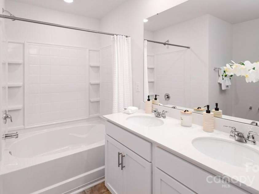 154 Shorthorn Road, Fletcher, NC 28732.  MLS# CAR4204391, YatesRealty ID 9. Photo is from a furnished model home of the same floorplan.