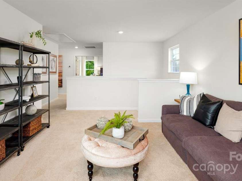 154 Shorthorn Road, Fletcher, NC 28732.  MLS# CAR4204391, YatesRealty ID 9. Photo is from a furnished model home of the same floorplan.