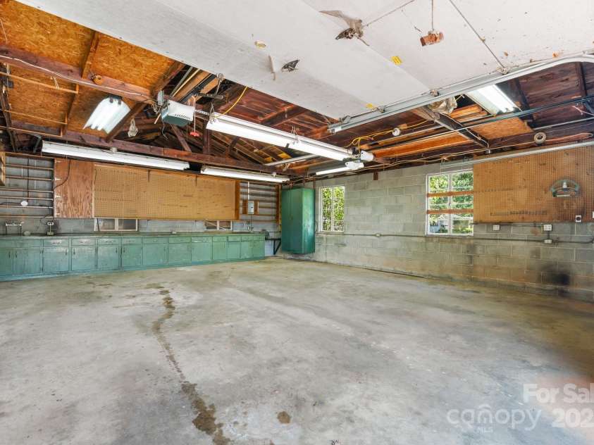 4002 Hickory Boulevard, Granite Falls, NC 28630.  MLS# CAR4265379, YatesRealty ID 900. Detached Garage End Bays