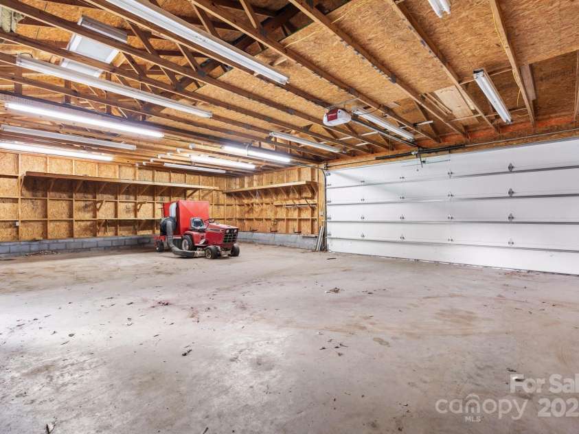 4002 Hickory Boulevard, Granite Falls, NC 28630.  MLS# CAR4265379, YatesRealty ID 900. Far Left Garage Bay