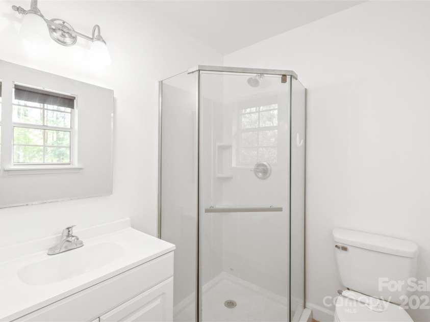 111 Pine Grove Church Road, Concord, NC 28025.  MLS# CAR4245554, YatesRealty ID 9001. Newer shower in primary bathroom