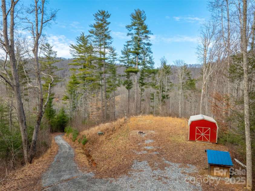 2504 Upper Paw Paw Road, Marshall, NC 28753.  MLS# CAR4214272, YatesRealty ID 9002. Shed and well house