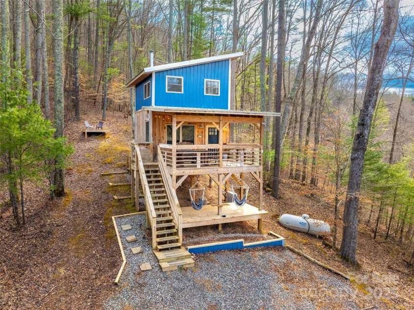 2504 Upper Paw Paw Road, Marshall, NC 28753.  MLS# CAR4214272, YatesRealty ID 9002. Site Built Home on 20+/- Acres