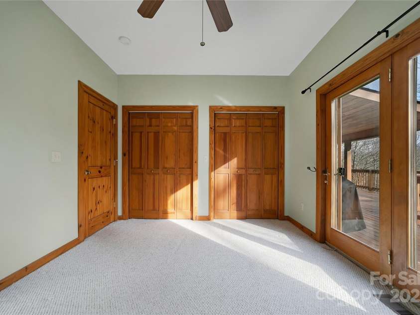 42 Tsitsi Court, Brevard, NC 28712.  MLS# CAR4326496, YatesRealty ID 9005. 2nd bedroom with deck access