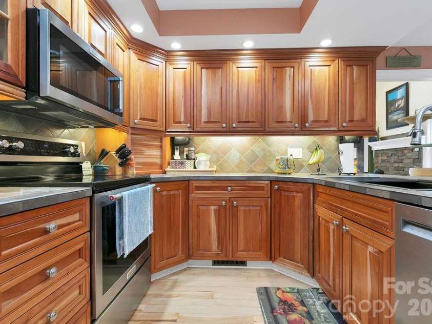 410 Forest Lake Road, Brevard, NC 28712.  MLS# CAR4364087, YatesRealty ID 9011. Gorgeous Cherry Cabinets