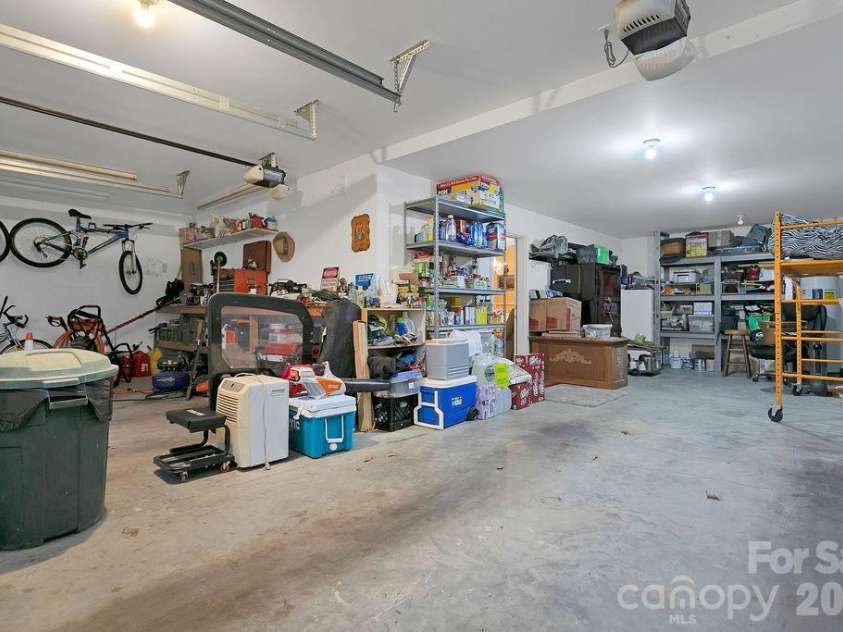 410 Forest Lake Road, Brevard, NC 28712.  MLS# CAR4364087, YatesRealty ID 9011. Oversized Garage In Basement