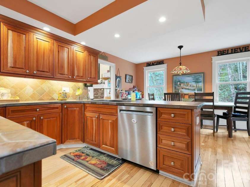 410 Forest Lake Road, Brevard, NC 28712.  MLS# CAR4364087, YatesRealty ID 9011. Spacious Kitchn