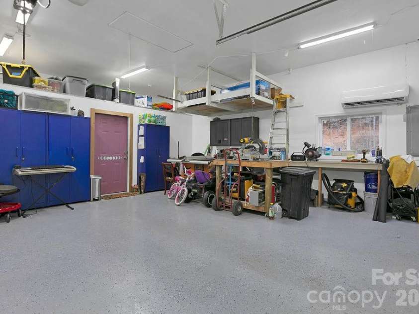 410 Forest Lake Road, Brevard, NC 28712.  MLS# CAR4364087, YatesRealty ID 9011. Workshop in Detached Garage