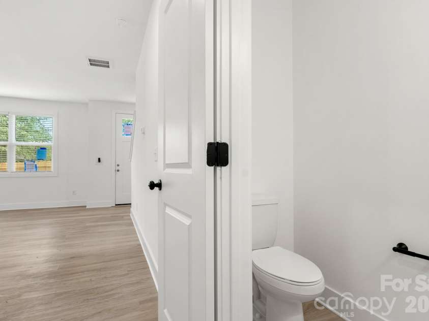 4431 Fair Street, Charlotte, NC 28208.  MLS# CAR4365773, YatesRealty ID 9013. Half Bath Main Floor