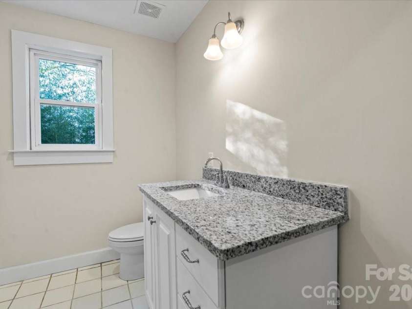 165 Lacy Street, Chester, SC 29706.  MLS# CAR4338472, YatesRealty ID 9016. Bathroom