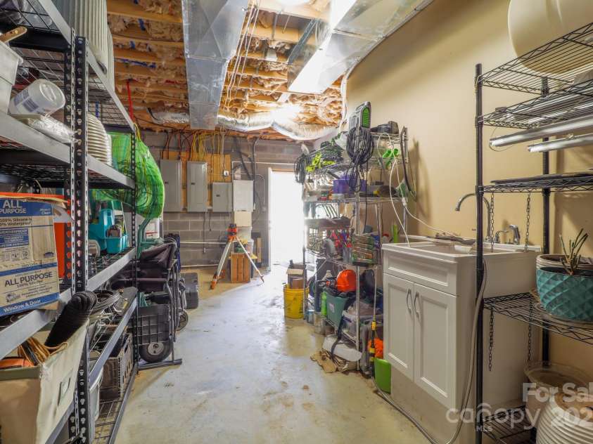 146 Green Briar Lane, Green Mountain, NC 28740.  MLS# CAR4287422, YatesRealty ID 9017. Basement Mechanical and Storage