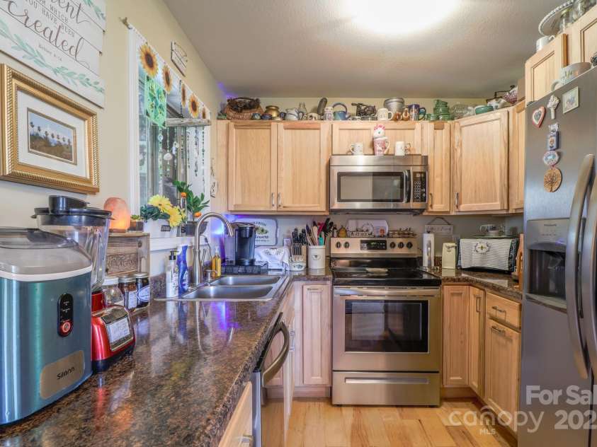 146 Green Briar Lane, Green Mountain, NC 28740.  MLS# CAR4287422, YatesRealty ID 9017. Upper Level Kitchen