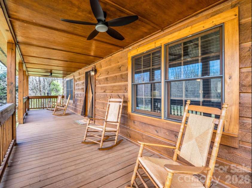 175 Pink Campbell Road, Landrum, SC 29356.  MLS# CAR4359870, YatesRealty ID 9018. Large front porch complete with ceiling fan/lights.