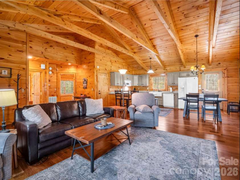 175 Pink Campbell Road, Landrum, SC 29356.  MLS# CAR4359870, YatesRealty ID 9018. Looking back toward the dining area, kitchen and back door.
