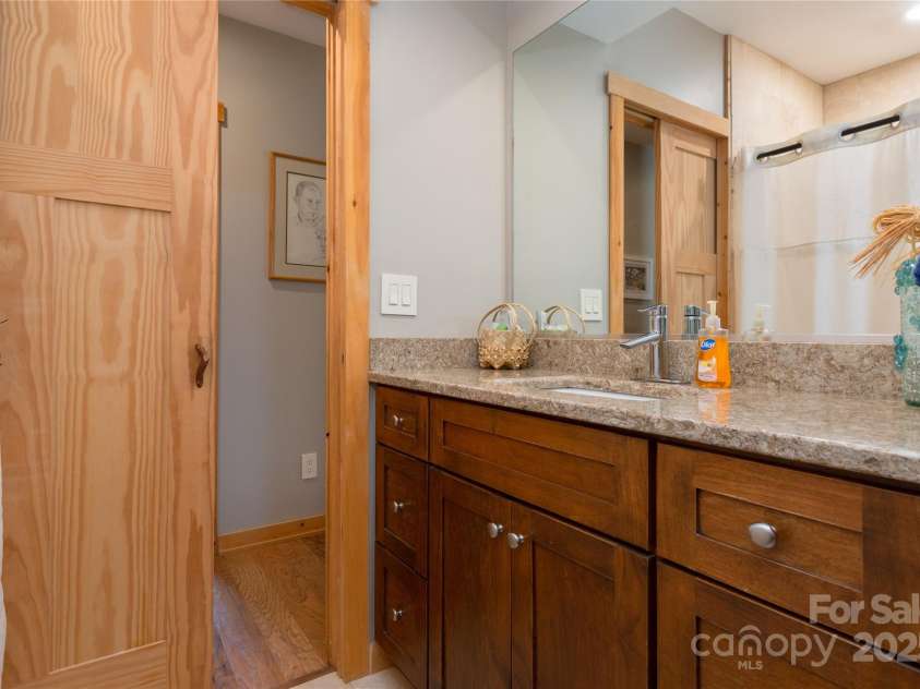 263 Mine Cove Road, Spruce Pine, NC 28777.  MLS# CAR4244163, YatesRealty ID 9018. Second full bath upper