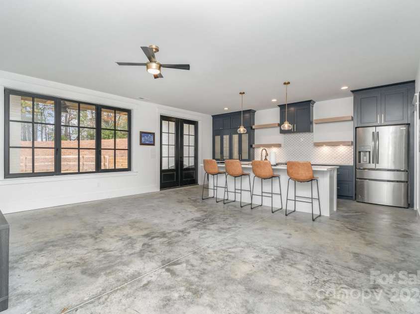 670 Stegall Road, Peachland, NC 28133.  MLS# CAR4198863, YatesRealty ID 902. Basement kitchen