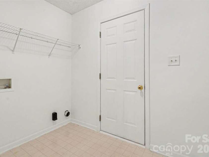 205 Amir Circle, Matthews, NC 28105.  MLS# CAR4356805, YatesRealty ID 9020. Laundry Room