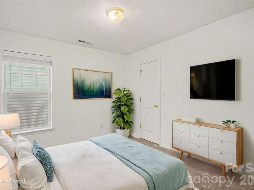 205 Amir Circle, Matthews, NC 28105.  MLS# CAR4356805, YatesRealty ID 9020. Primary Bedroom virtual staging 