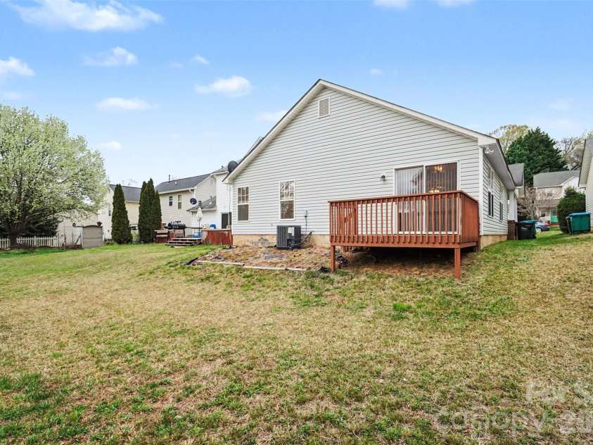 205 Amir Circle, Matthews, NC 28105.  MLS# CAR4356805, YatesRealty ID 9020. Rear Exterior