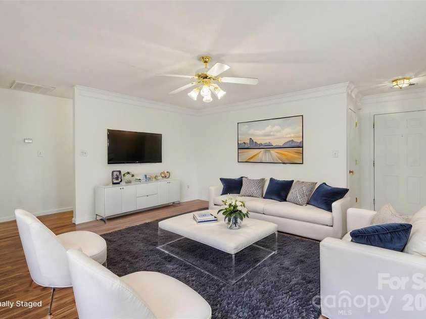 205 Amir Circle, Matthews, NC 28105.  MLS# CAR4356805, YatesRealty ID 9020. Virtual staging living room