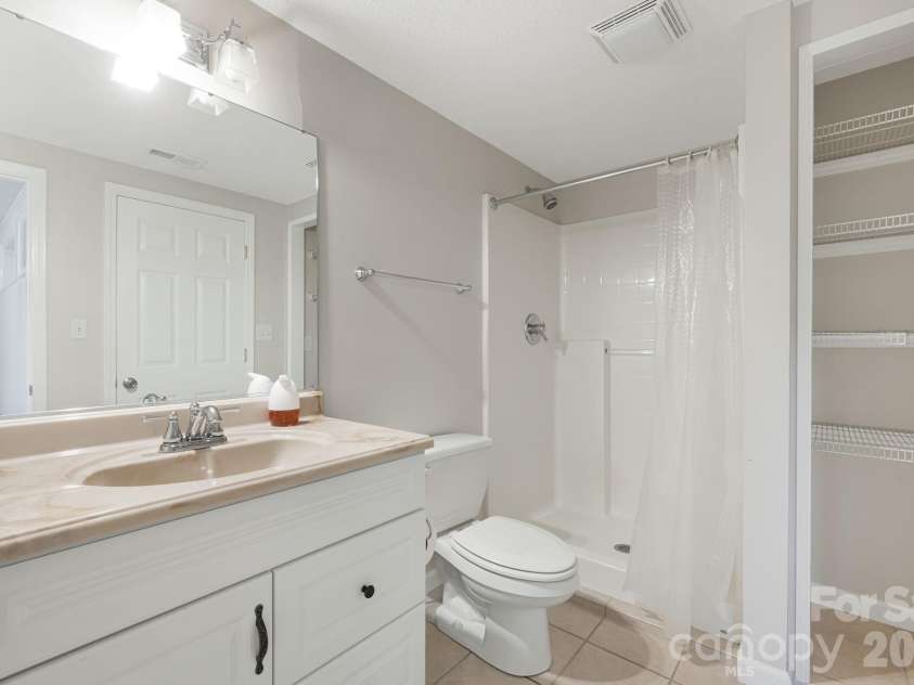 207 Christina Court, Asheville, NC 28806.  MLS# CAR4330846, YatesRealty ID 9023. Lower Level Bath