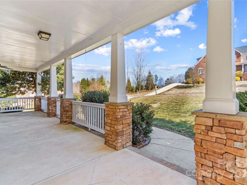 137 Hunters Hill Drive, Statesville, NC 28677.  MLS# CAR4230456, YatesRealty ID 9033. Expansive covered front porch